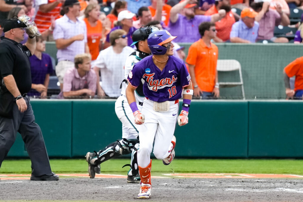 Cam Cannarella hits fly ball that scores a run.